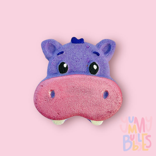 Purple hippo shaped head painted with light pink, white, dark purple, and black