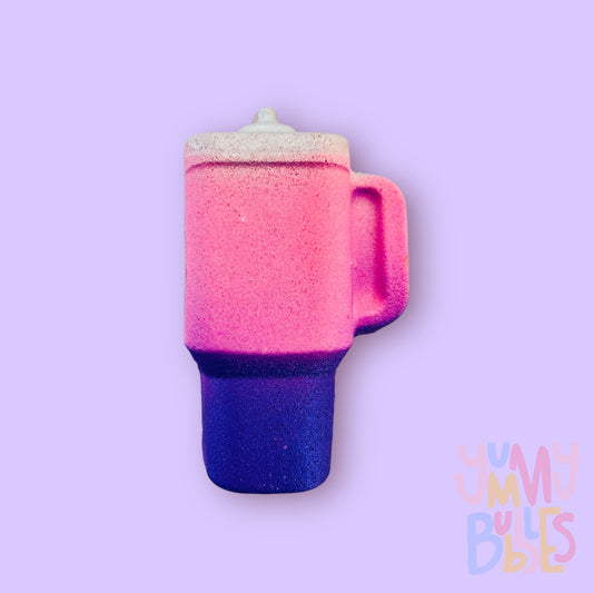 Pink tall cup shaped bath bomb painted with a purple base and a white top
