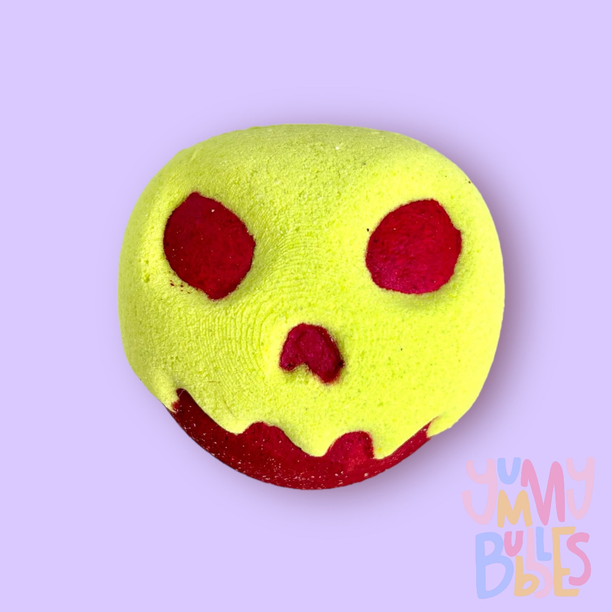 Red apple shaped bath bomb with a green overlay on top