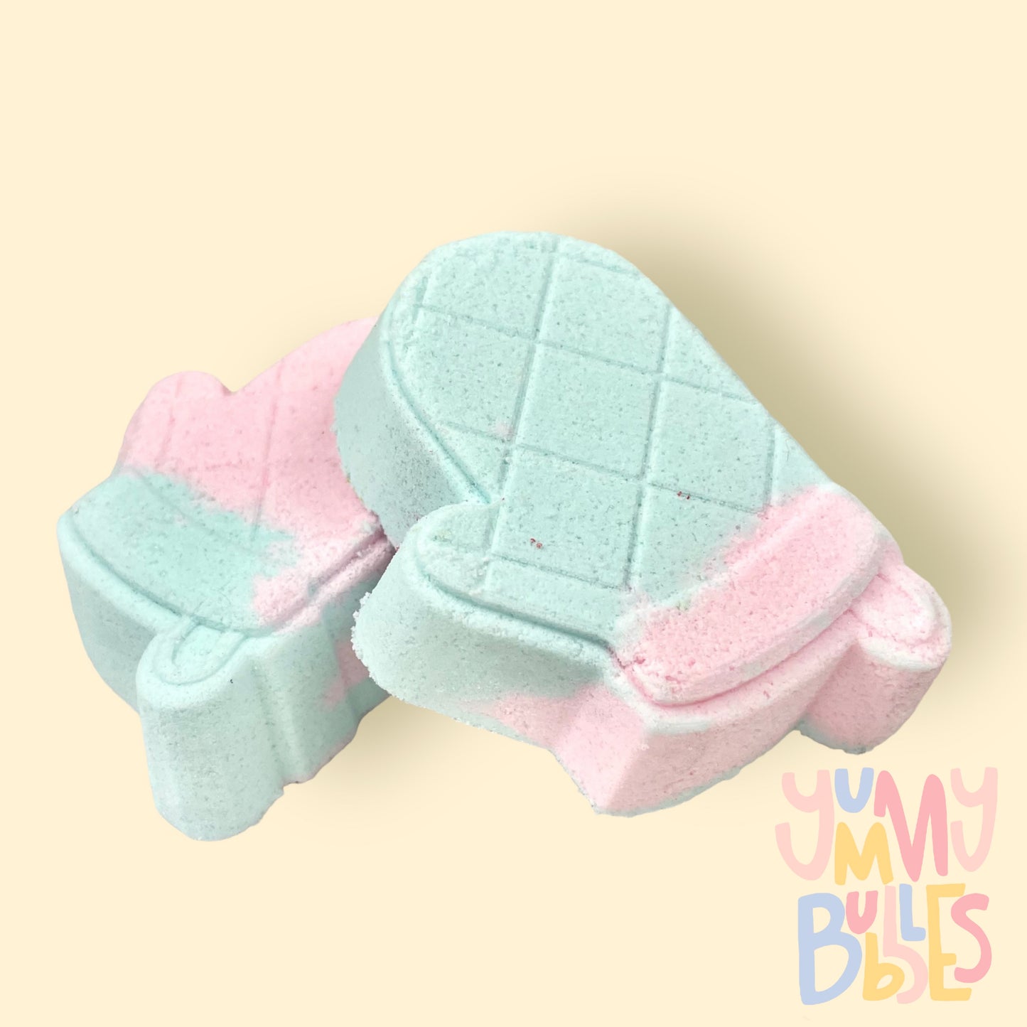 Light blue and light pink oven mitt shaped bath bomb