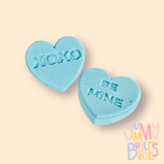 Blue candy gram shaped bath bomb with sweet message such as xoxo, be mine, etc