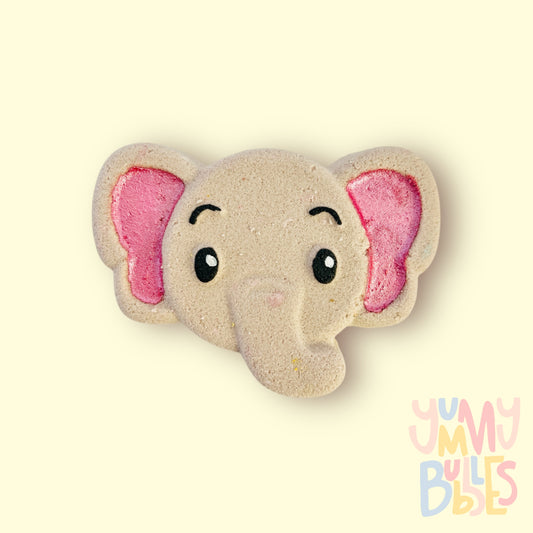 Grey elephant shaped bath bomb painted with light pink, black, and white