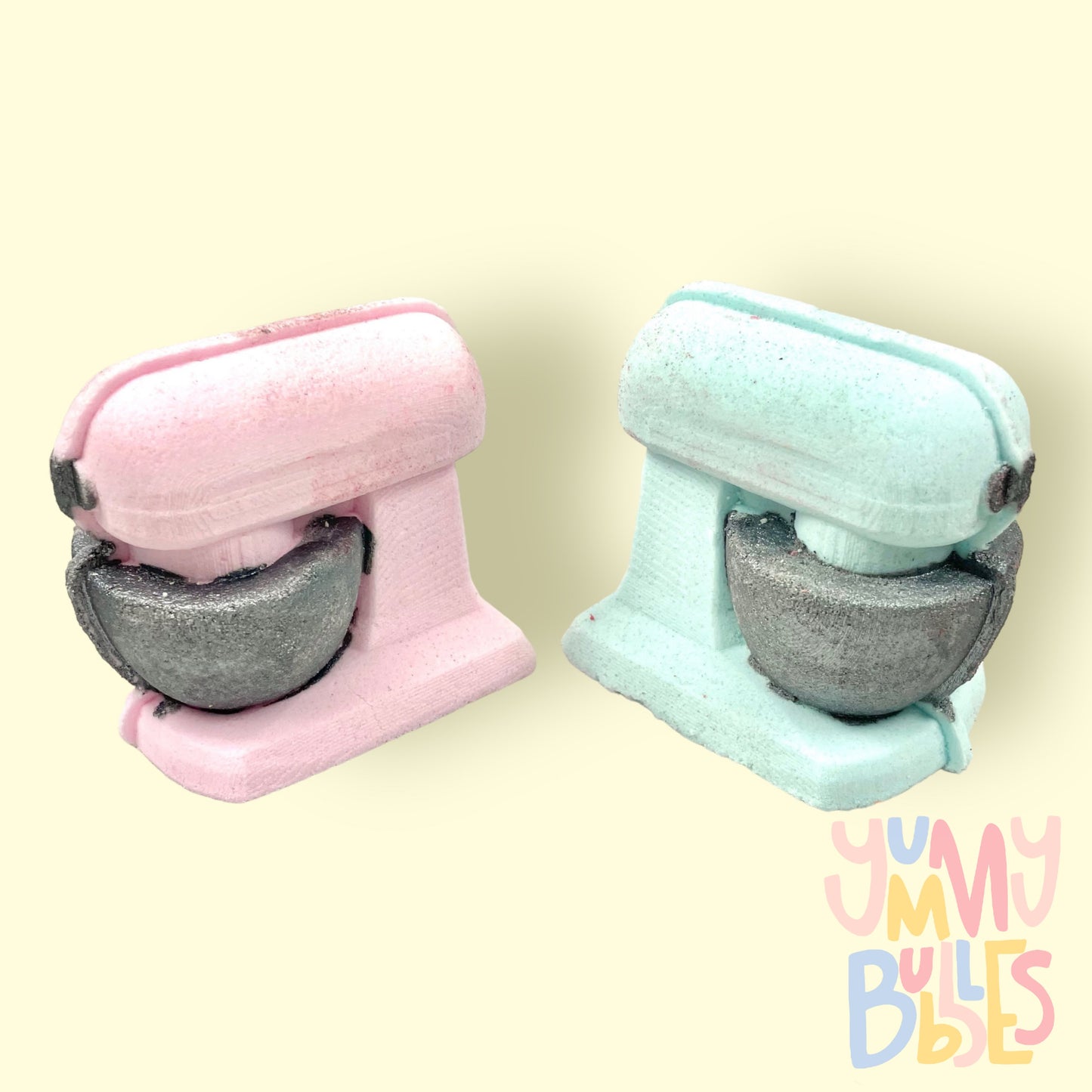 Mixer shaped bath bomb in pink or blue. Bowl and details are painted in grey