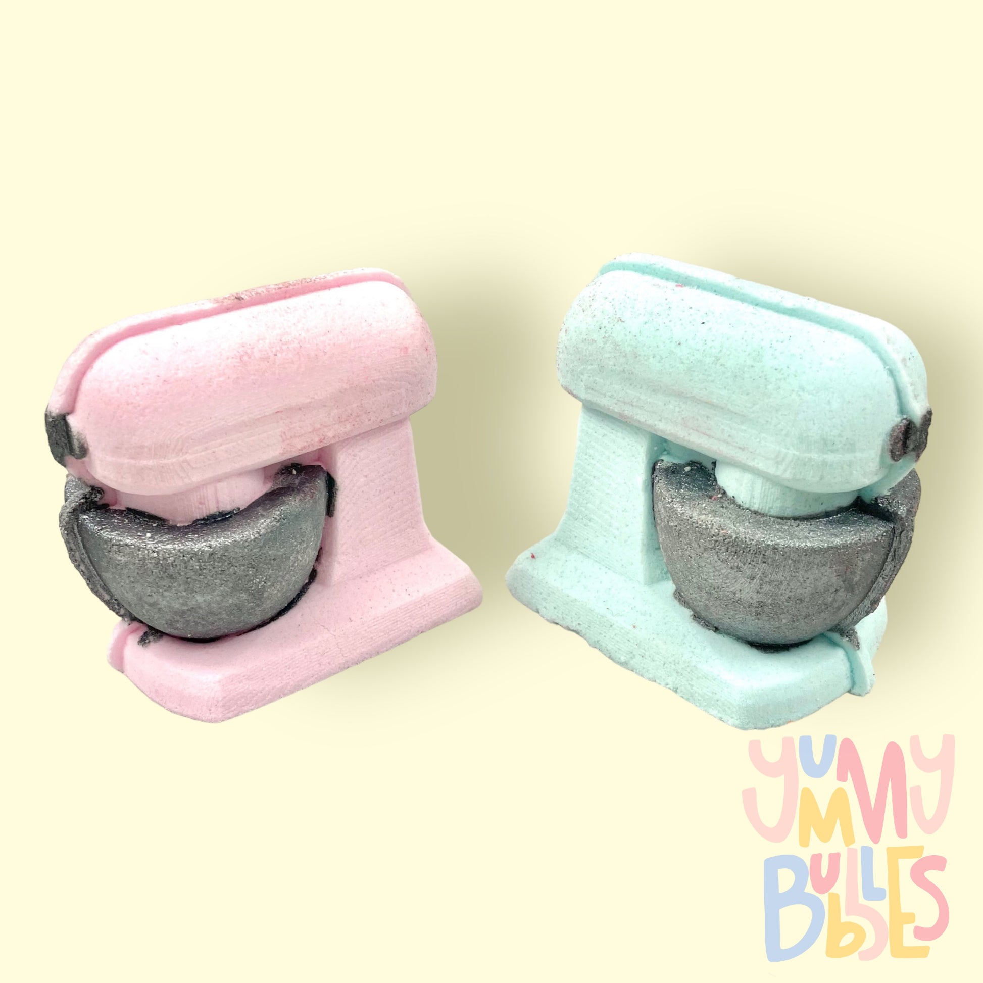 Mixer shaped bath bomb in pink or blue. Bowl and details are painted in grey