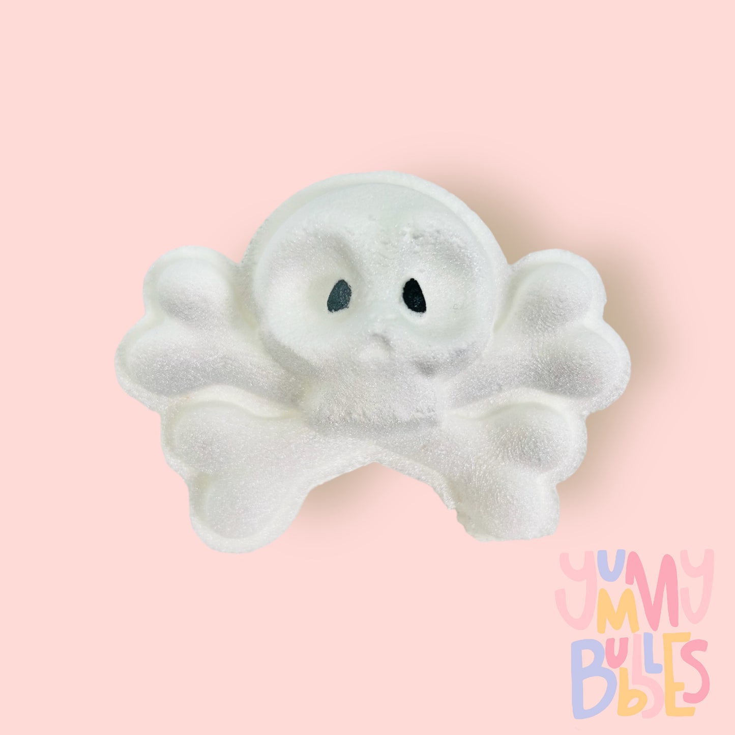 White skull and bones detailed with light grey airbrushing and the eyes painted black