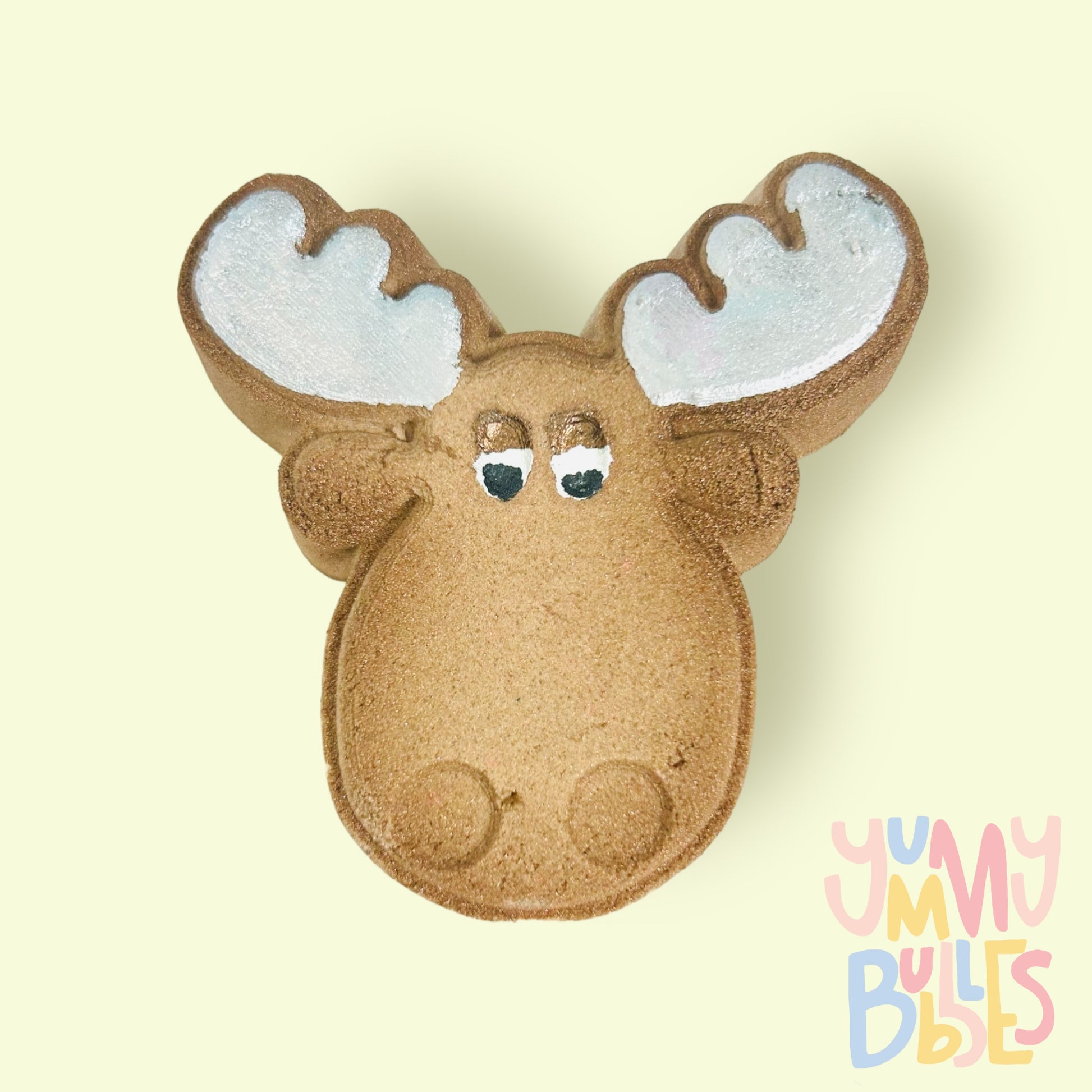 Brown moose shaped bath bomb painted with white and black