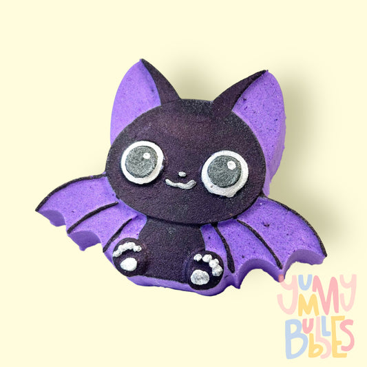Purple bat shaped bath bomb with black and white paint