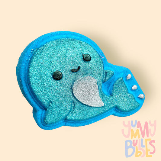 Blue whale shaped bath bomb painted with light blue, white, and black