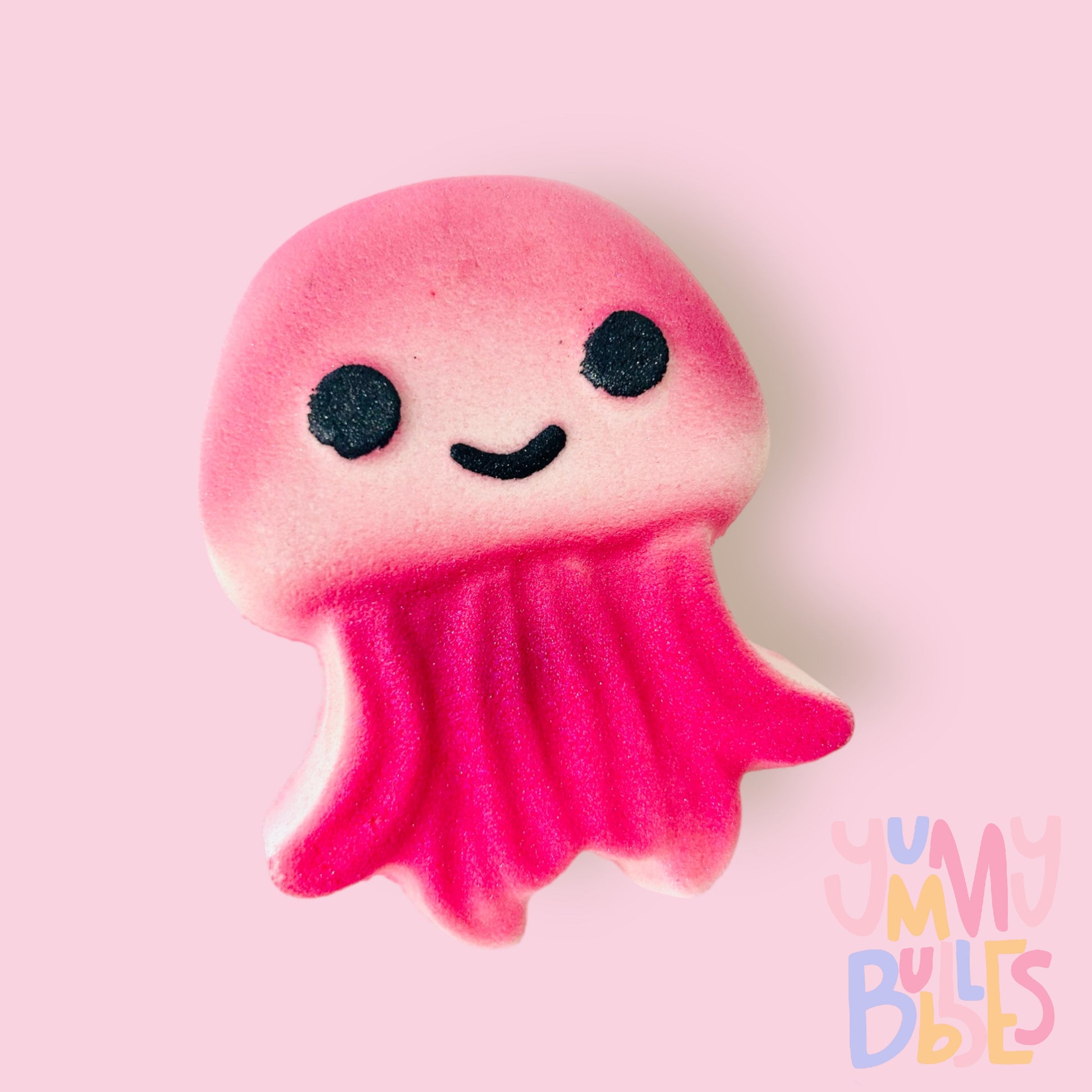 Jelly fish shaped bath bomb painted with pink and black