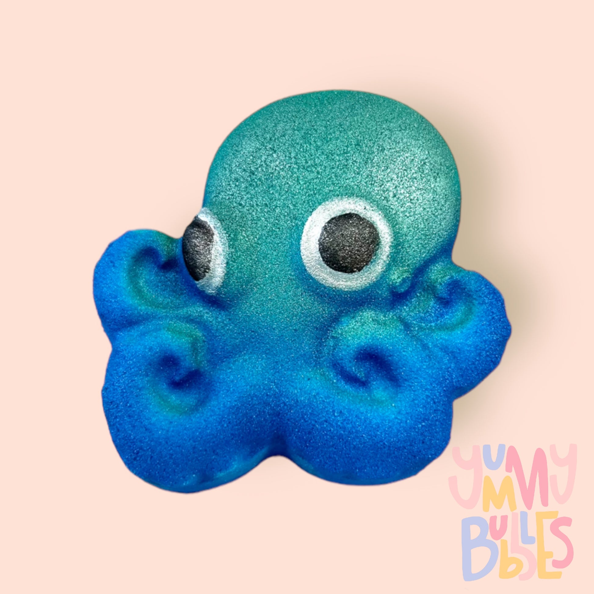 Octopus shaped bath bomb painted with a teal and blue gradient