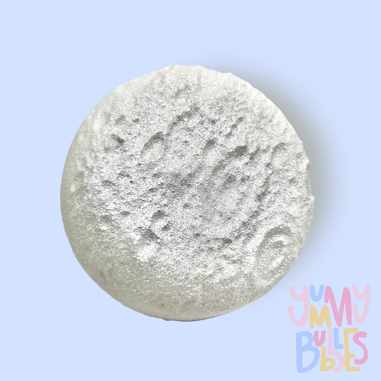 White Circular moon shaped bath bomb airbrushed with grey