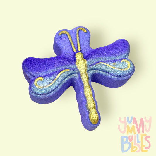Purple dragonfly shaped bath bomb with gold paint and a white ombre