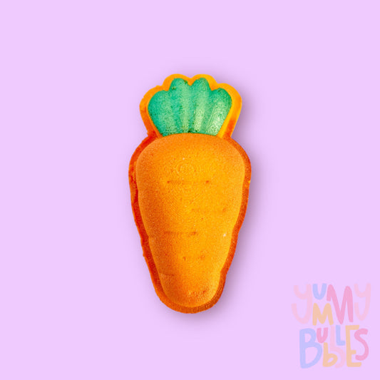 Orange carrot shaped bath bomb with green and dark orange paint