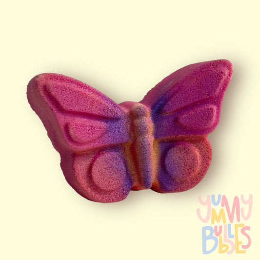 Pink butterfly shaped bath bomb airbrushed with purple and orange to highlight features
