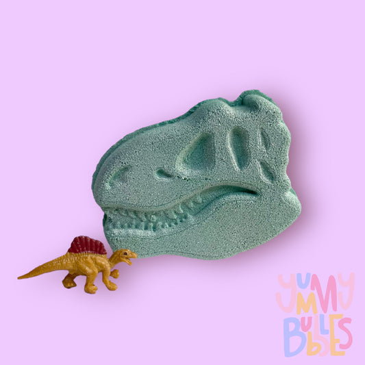 Teal dino fossil head shaped bath bomb airbrushed with grey highlights