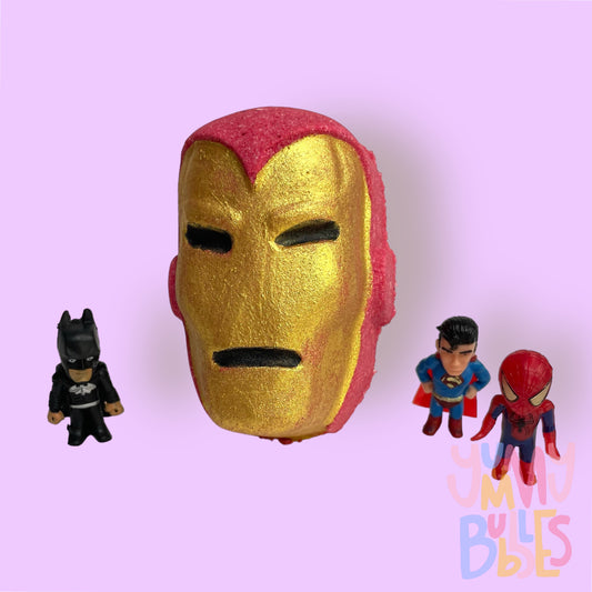Red iron man head shaped bath bomb painted with gold and black