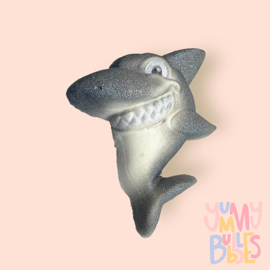 White shark shaped bath bomb airbrushed with grey on the edges and painted with white and black