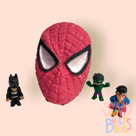 Red spider man mask shaped bath bomb painted with white and black for the eyes