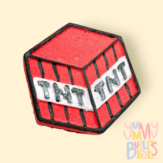 Red hexagon shaped bath bomb made to look like video game tnt. Painted with white and black