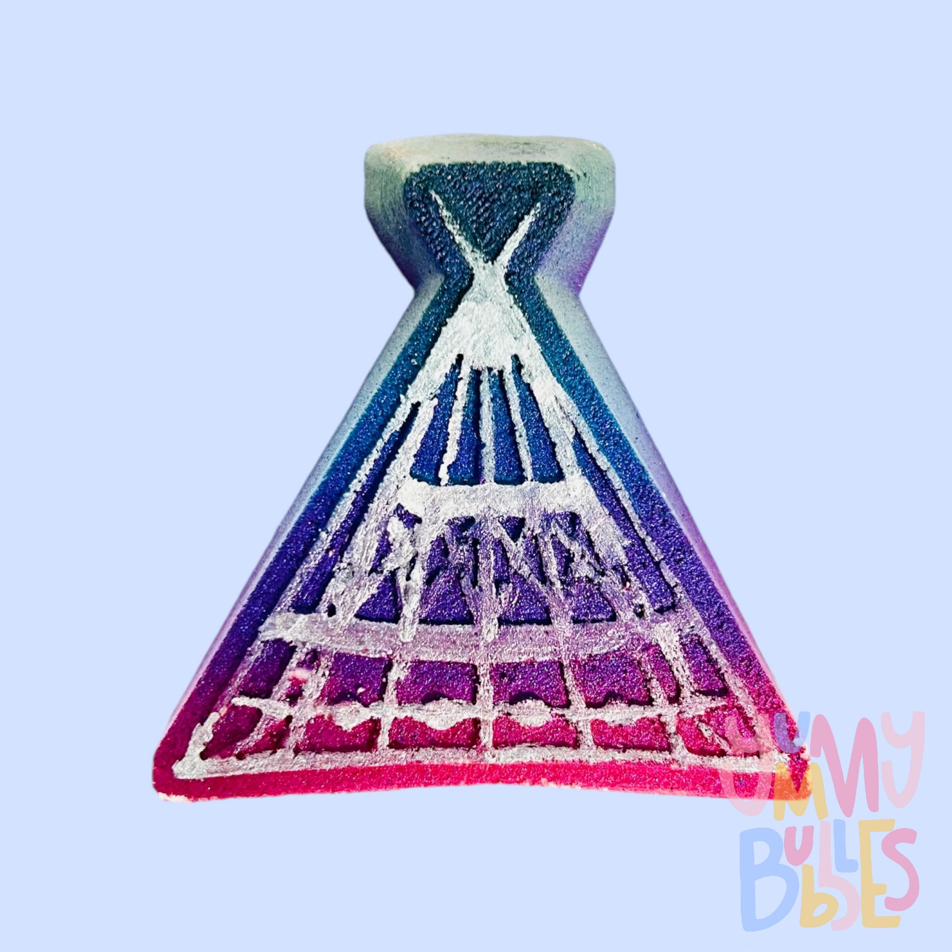 Medicine Hat teepee shaped bath bomb with a blue to pink gradient, painted with white to outline the teepee