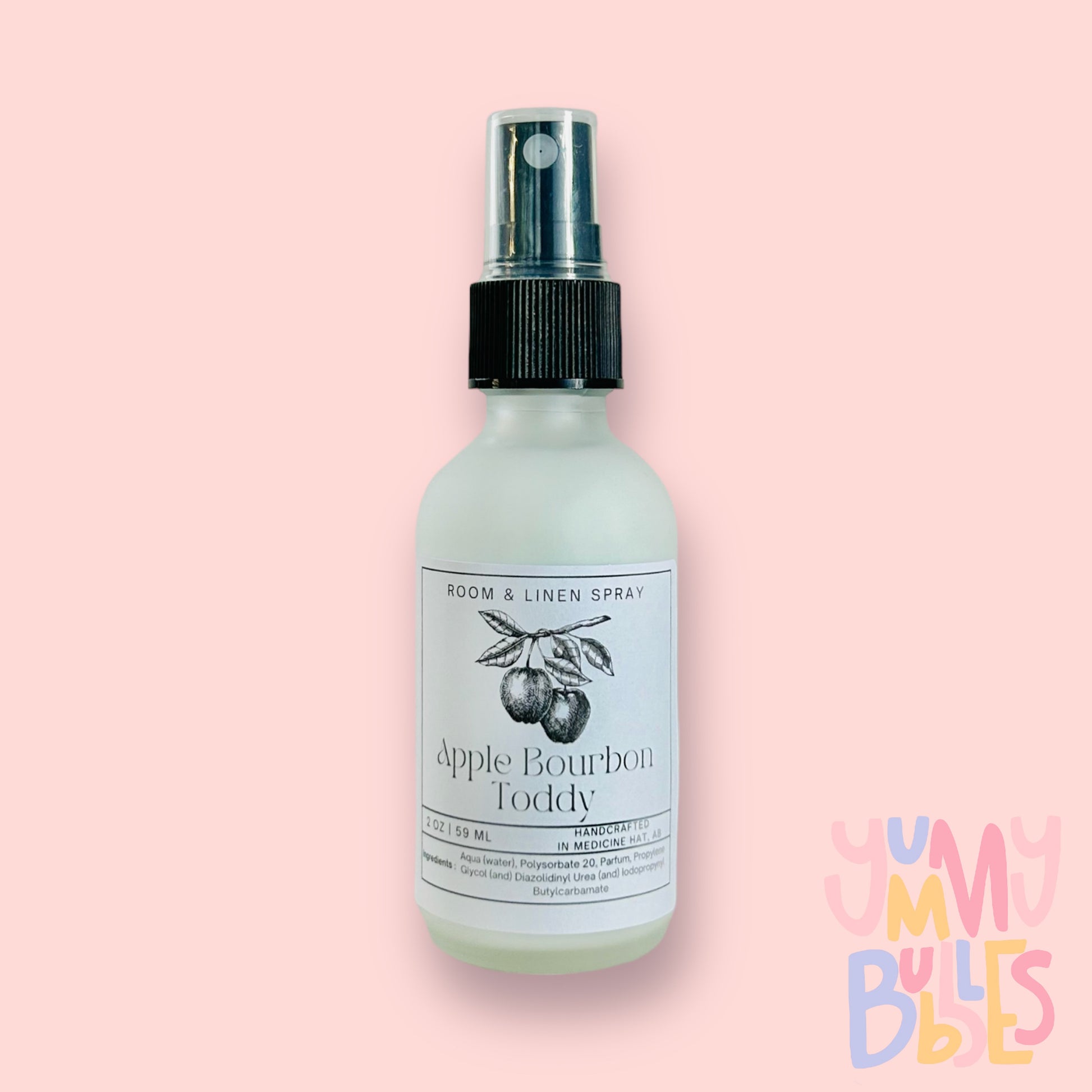 Room spray in tall glass spray bottles
