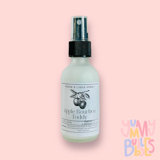 Room spray in tall glass spray bottles