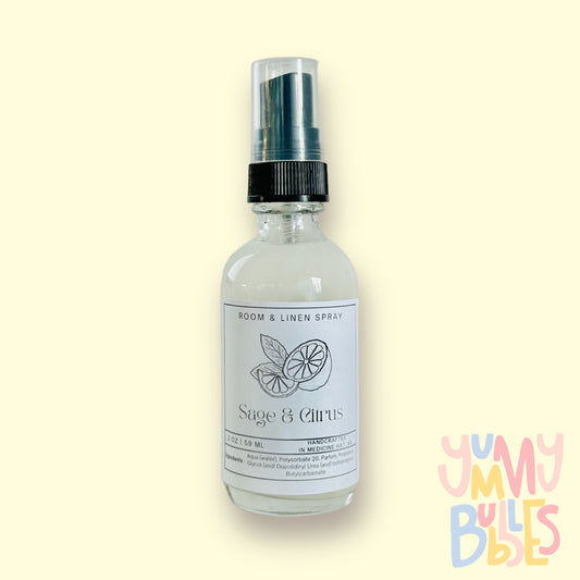 Room spray in tall glass spray bottles
