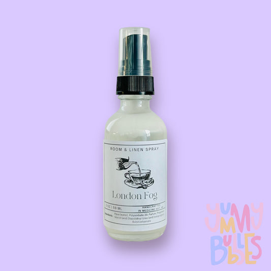 Room spray in tall glass spray bottles